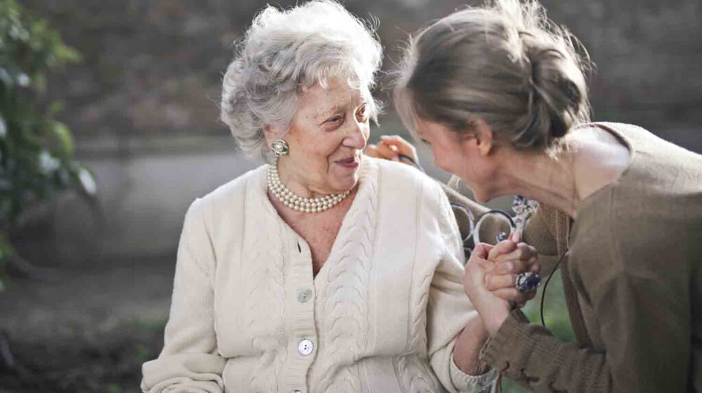 Elder Law attorney visiting with an elderly client.