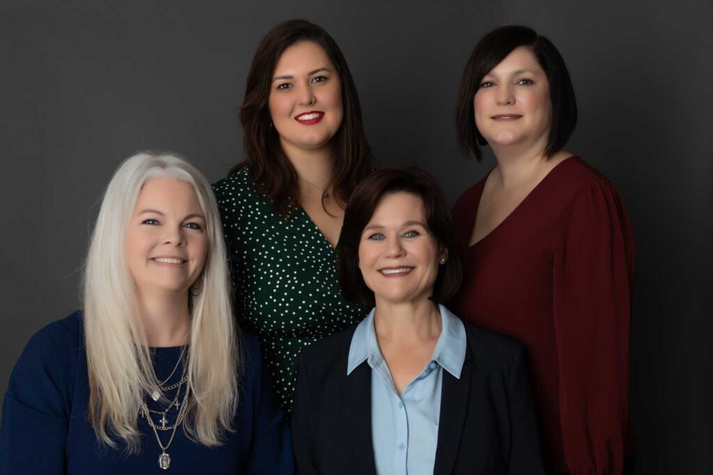 The Lockhart, Texas staff of M. Elizabeth Raxter.